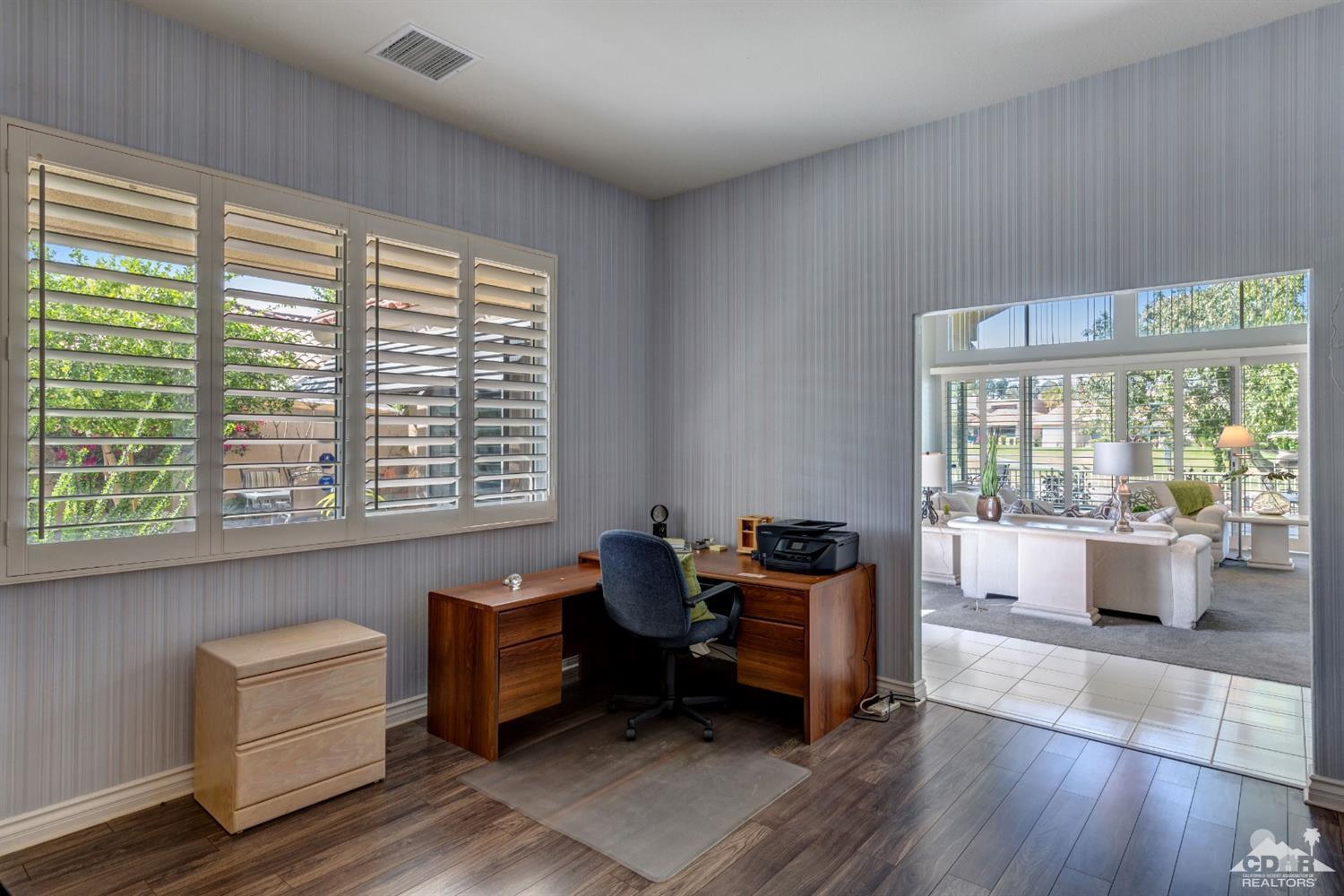 2 Hilton Head Drive Rancho Mirage, CA 92270 - Photo 20 of 40 a living room with furniture and windows