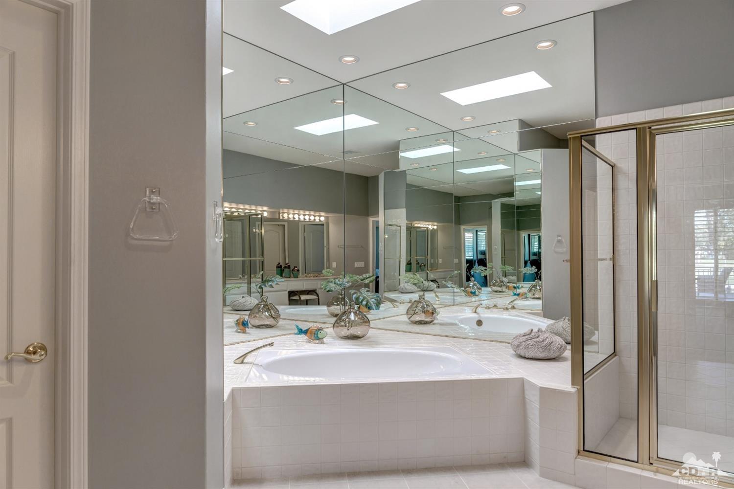 2 Hilton Head Drive Rancho Mirage, CA 92270 - Photo 25 of 40 a spacious bathroom with a sink mirror and shower