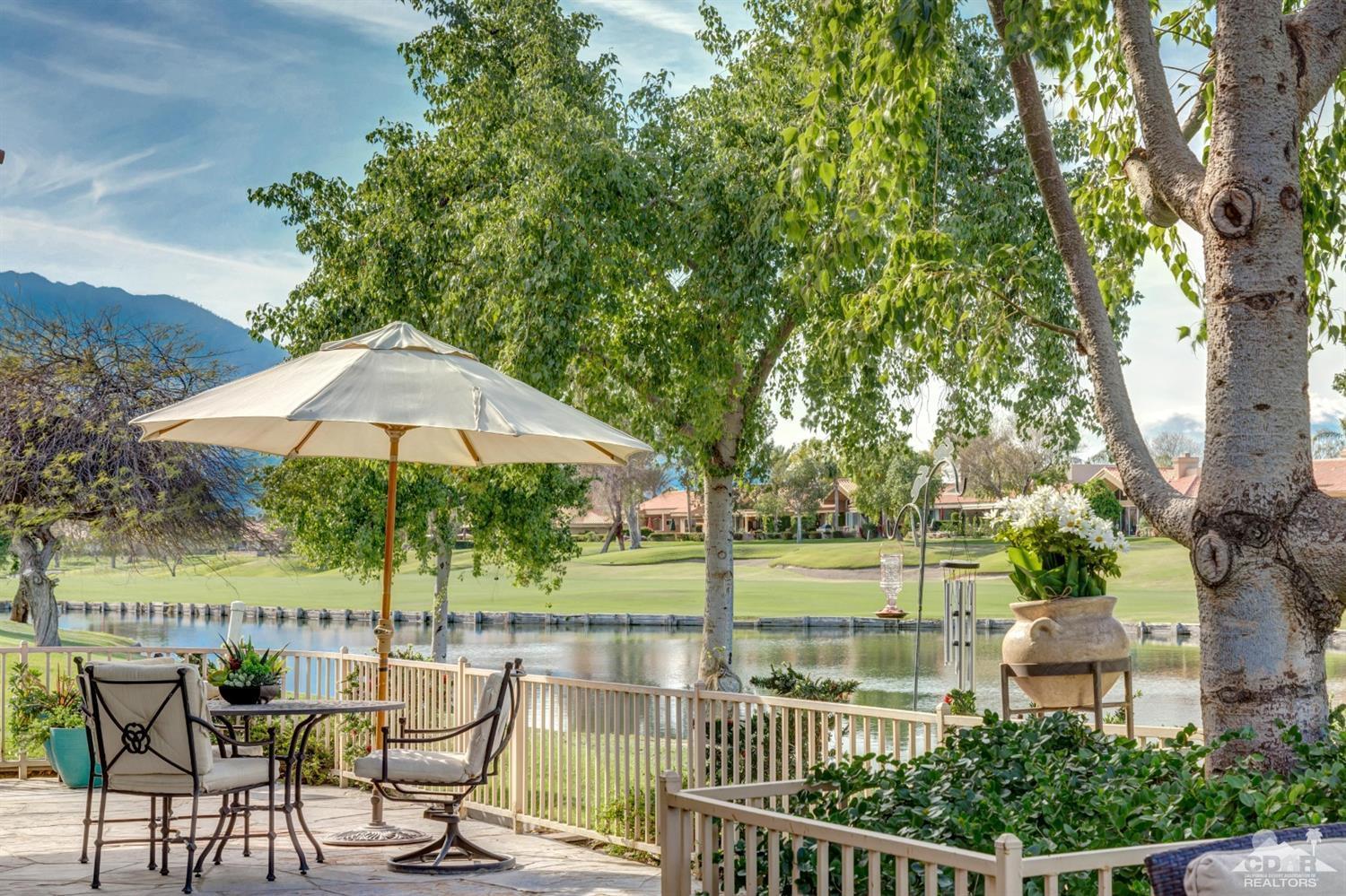 2 Hilton Head Drive Rancho Mirage, CA 92270 - Photo 33 of 40 an outdoor view of a patio with a garden