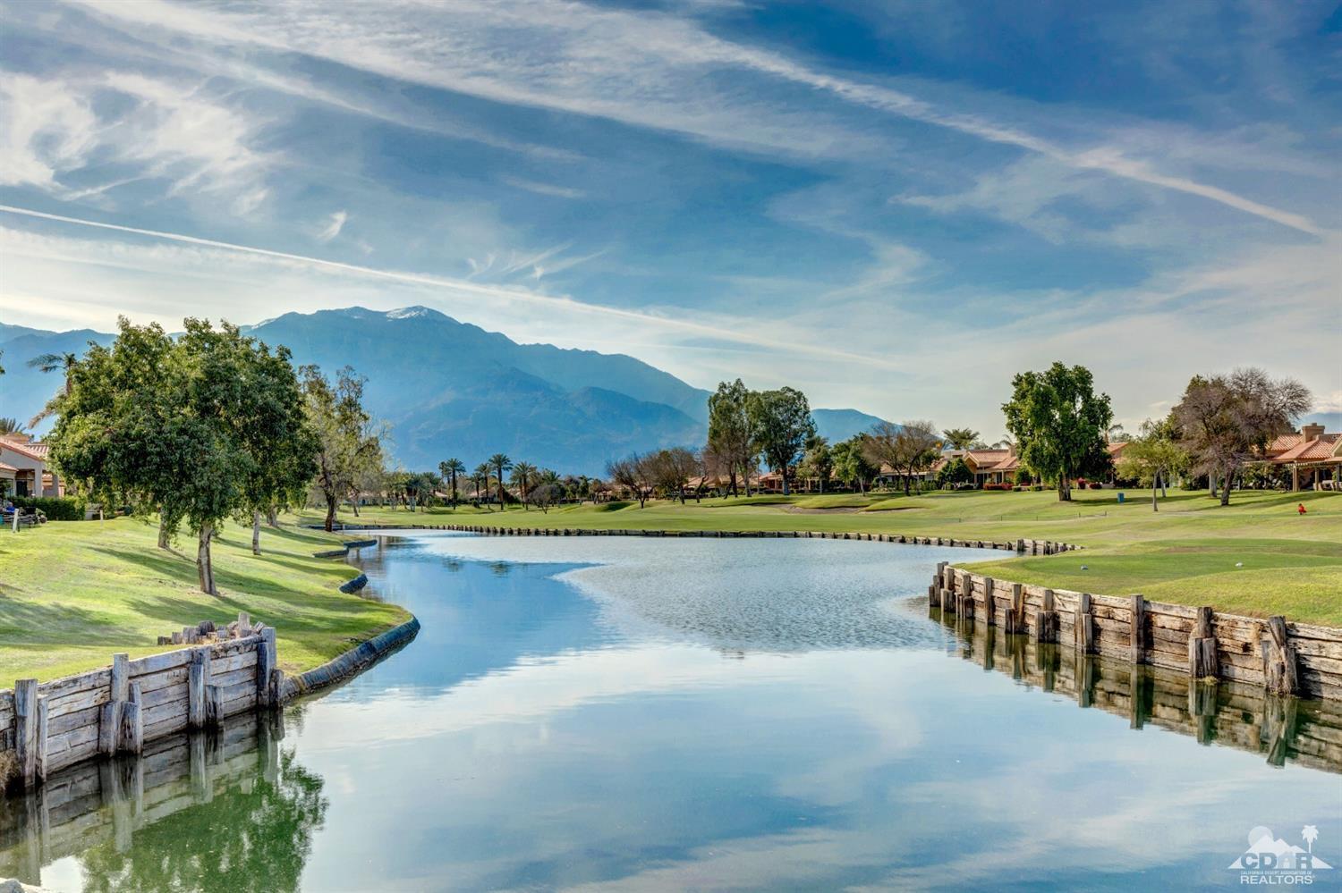 2 Hilton Head Drive Rancho Mirage, CA 92270 - Photo 37 of 40 a view of a lake with a yard