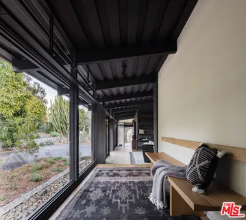 a kitchen with a stove and a microwave