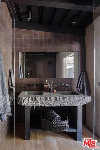 a view of a two chairs in the roof deck