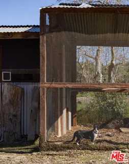 a view of a balcony with wooden floor