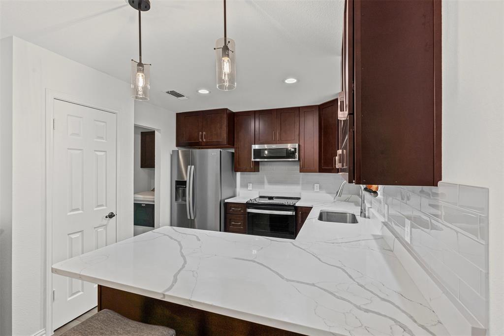 9013 Topperwind Court Fort Worth, TX 76134 - Photo 3 of 32 Updated kitchen with new fixtures and a pantry