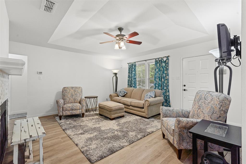 9013 Topperwind Court Fort Worth, TX 76134 - Photo 8 of 32 Living area with procelain tile floor