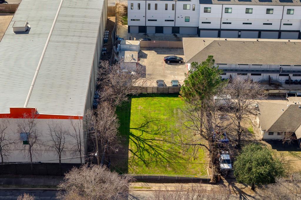 1725 North Prairie Avenue Dallas, TX 75204 - Photo 6 of 7 a view of building along with trees