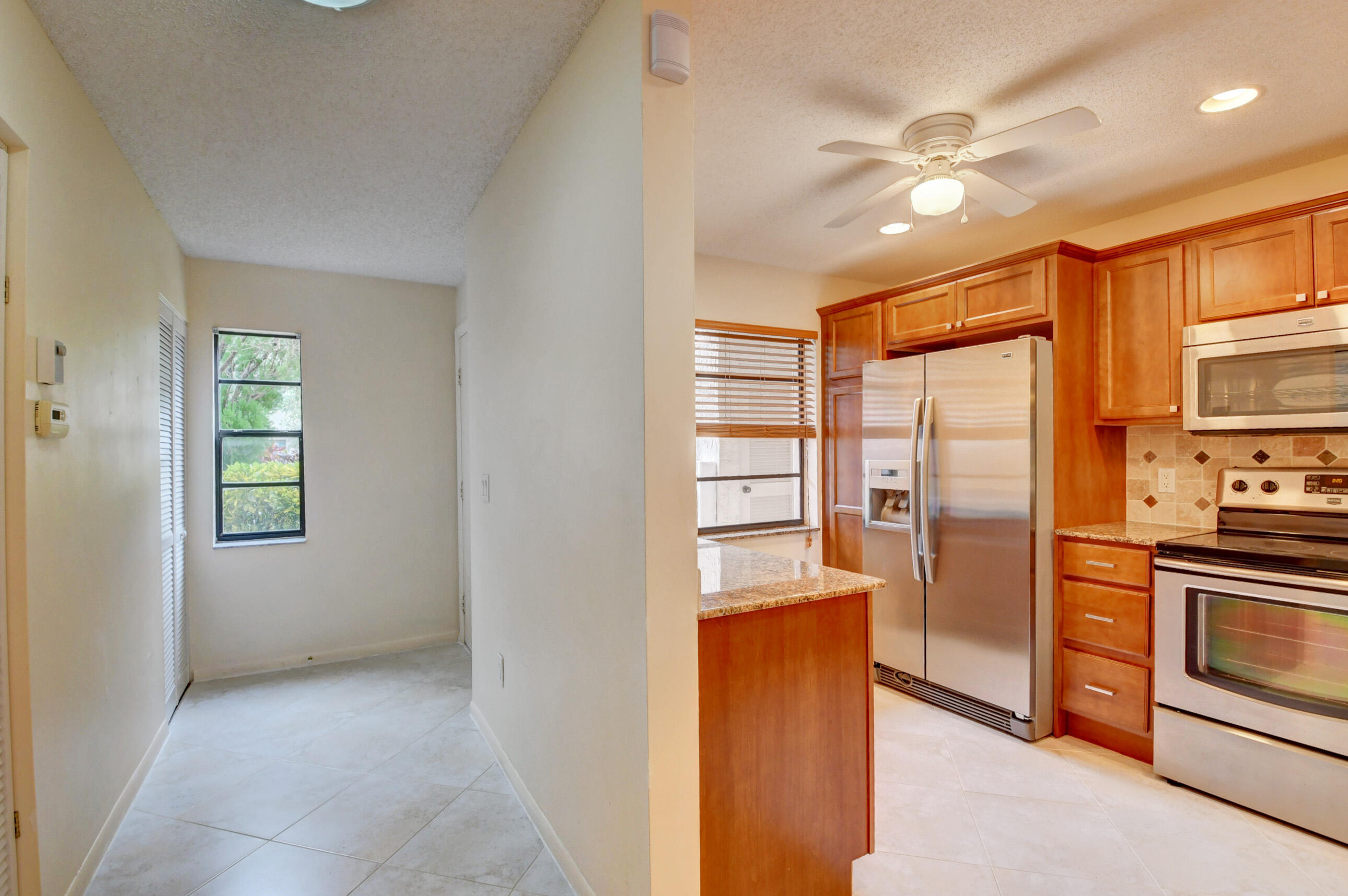 9277 Vista Del Lago, Unit E Boca Raton, FL 33428 - Photo 9 of 40 26_dsc_3066_67_68_69_70