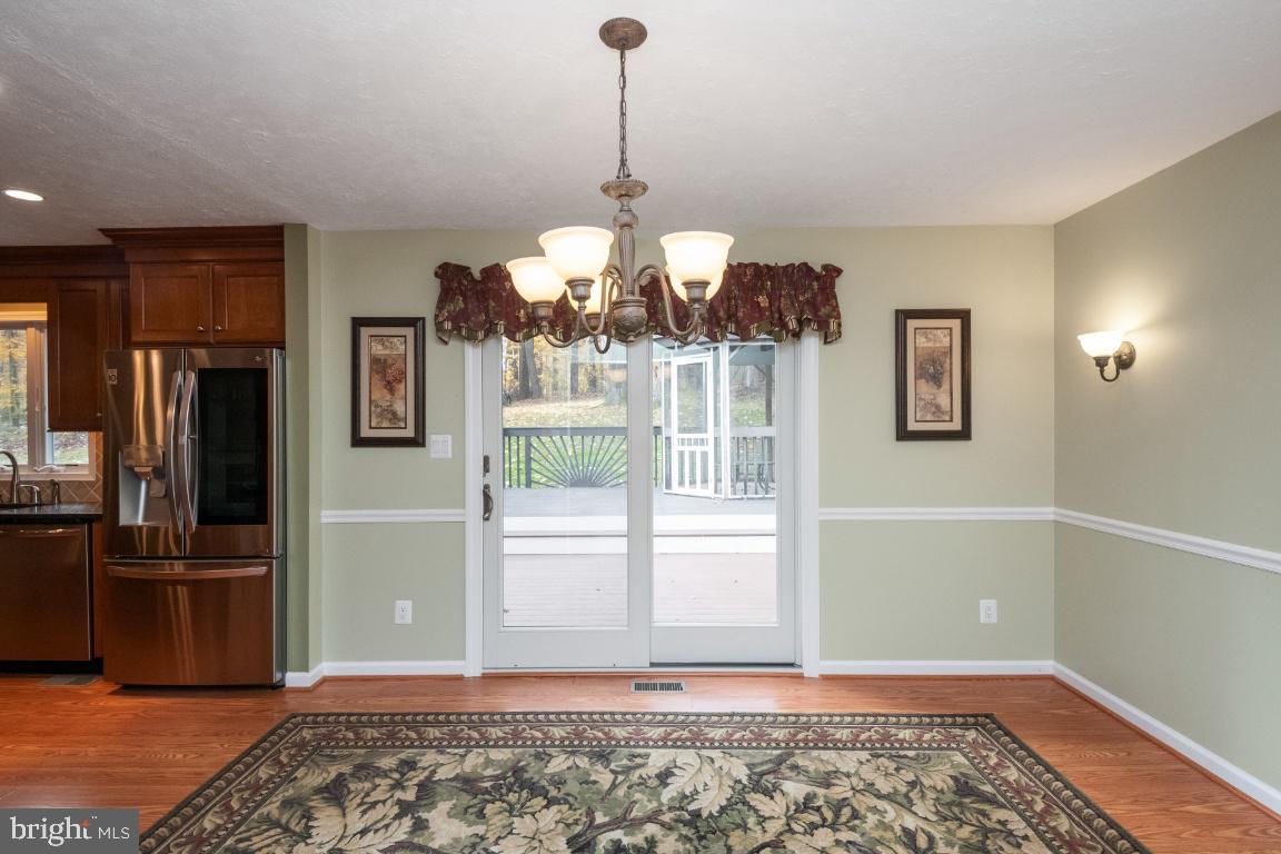 321 John Owings Road Westminster, MD 21158 - Photo 12 of 72 Dining Room and Sliders to Rear Deck
