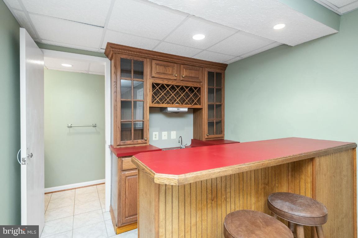 321 John Owings Road Westminster, MD 21158 - Photo 49 of 72 Basement Bar and Half Bath
