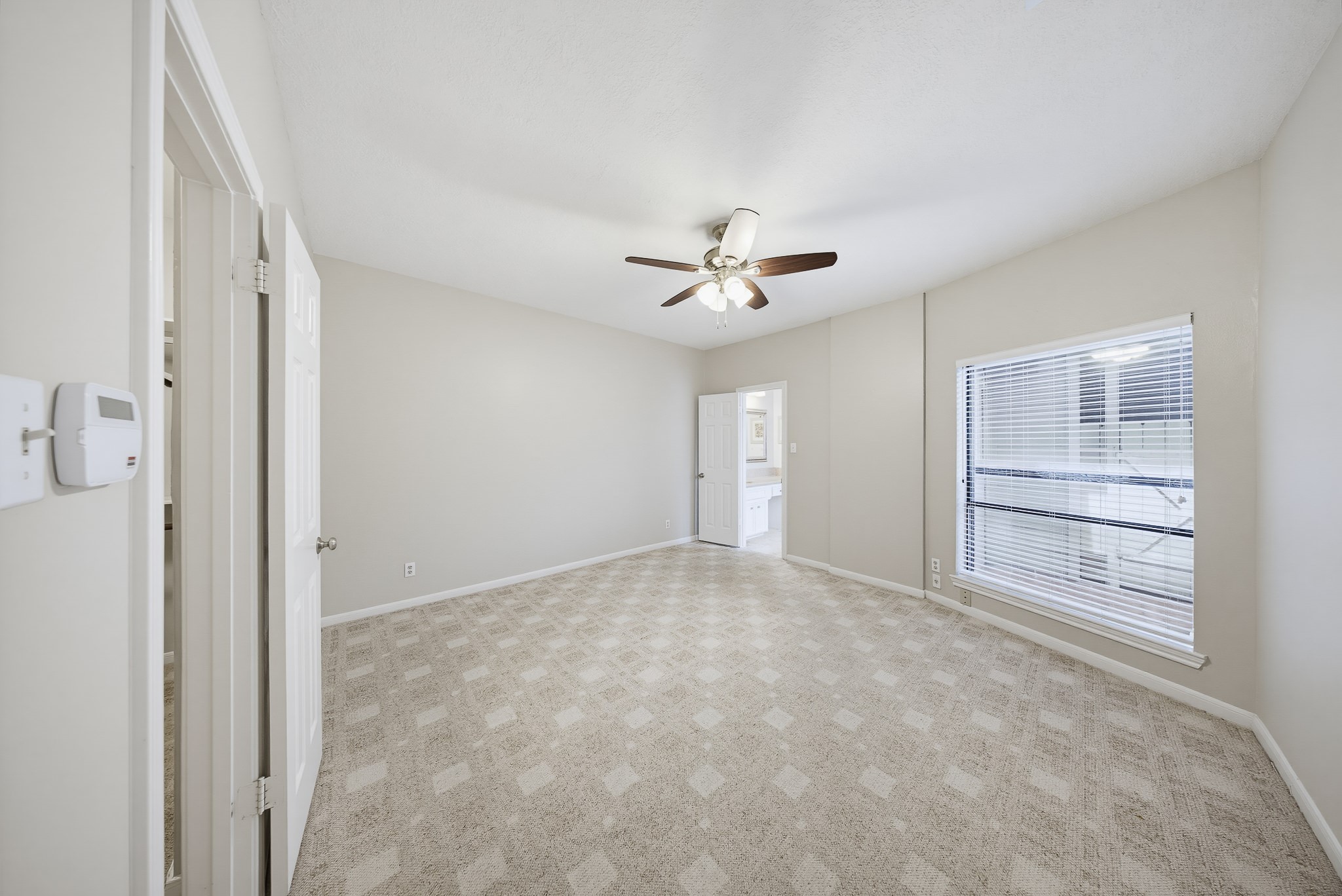 727 Bunker Hill Road, Unit 34 Houston, TX 77024 - Photo 19 of 38 The primary bedroom welcomes you with a spacious walk in closet and an ensuite bath.