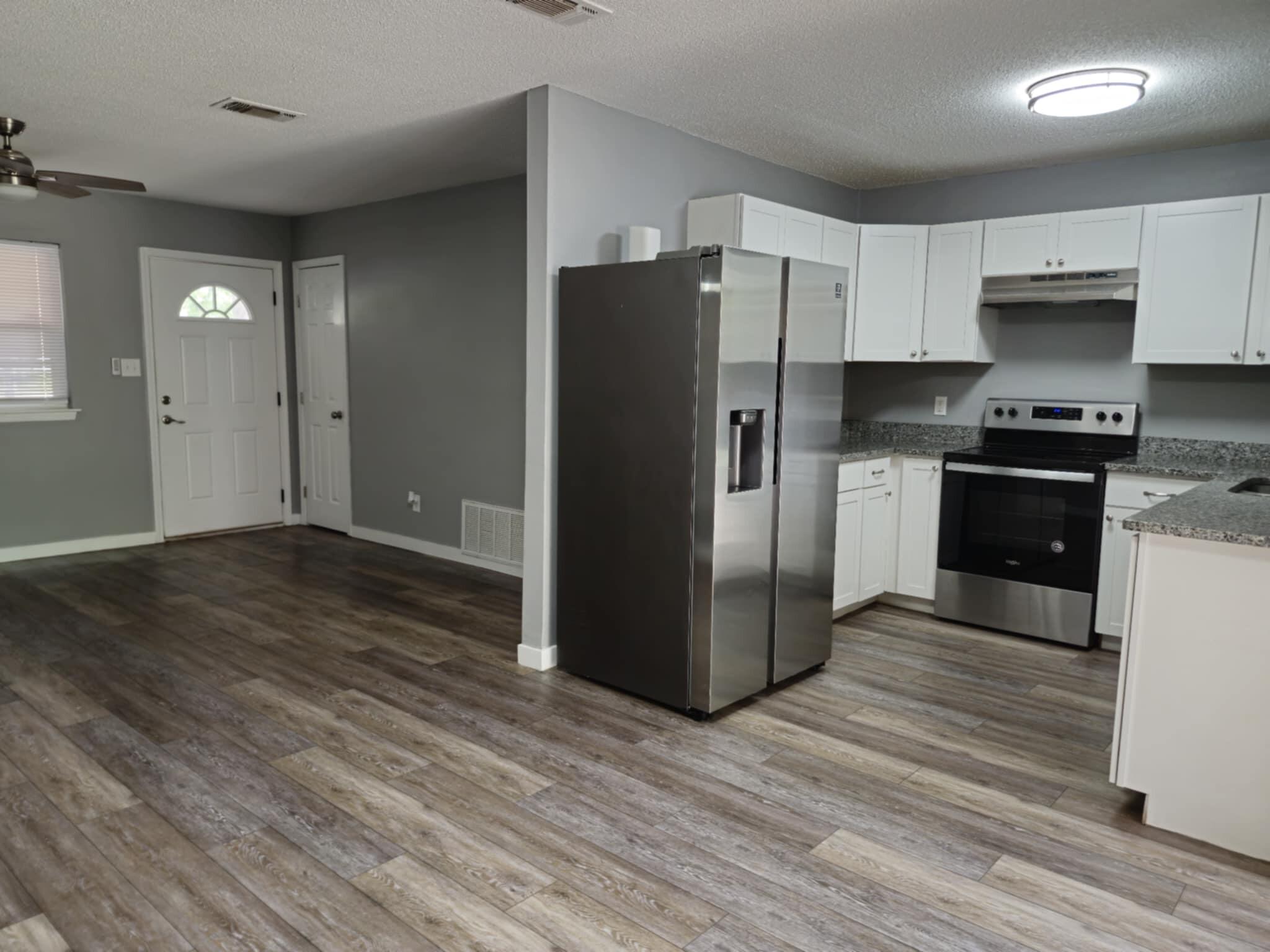 101 Blaylock Street Crestview, FL 32539 - Photo 13 of 21 Kitchen and Living