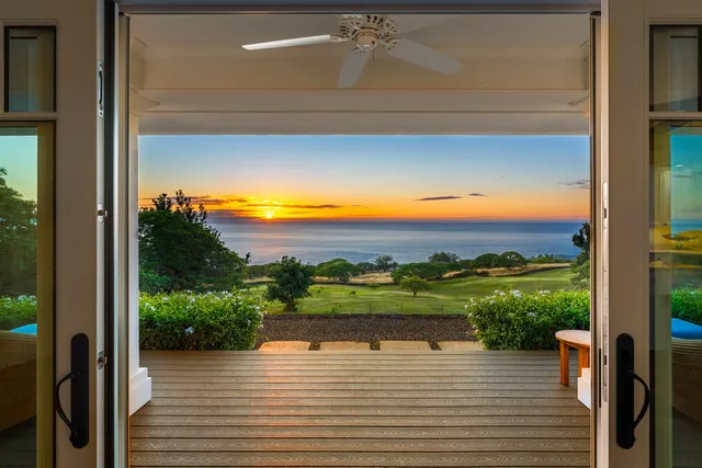 a view of a lake from a balcony