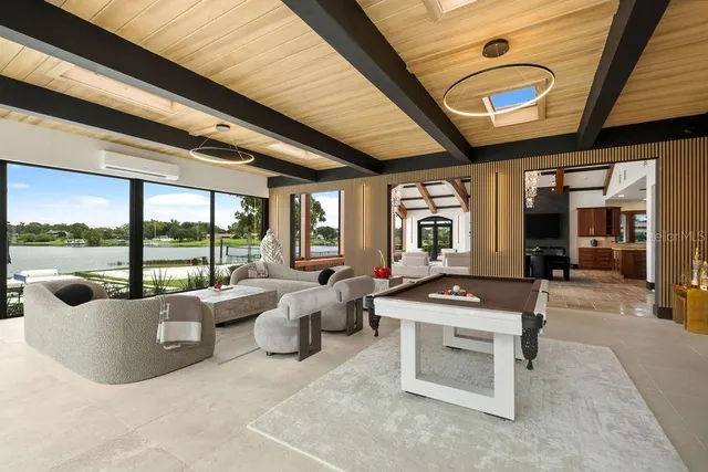 a kitchen with stainless steel appliances granite countertop a stove and a refrigerator