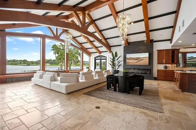 a kitchen with stainless steel appliances granite countertop sink cabinets and wooden floor