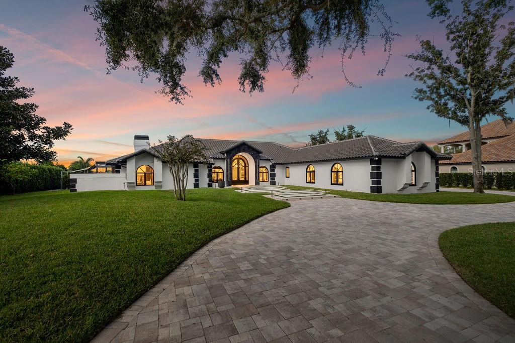 2844 Marquesas Court Windermere, FL 34786 - Photo 3 of 75 a front view of a house with a yard