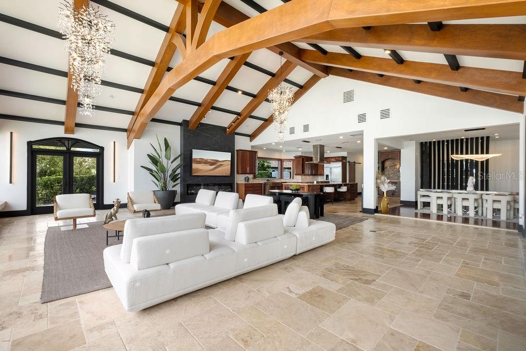 2844 Marquesas Court Windermere, FL 34786 - Photo 32 of 75 a living room with furniture and a chandelier