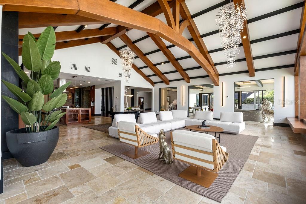 2844 Marquesas Court Windermere, FL 34786 - Photo 33 of 75 a living room with furniture a potted plant and a rug