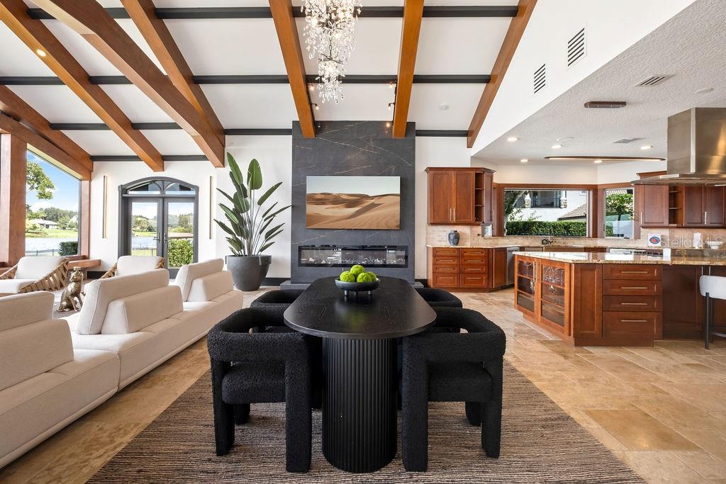 2844 Marquesas Court Windermere, FL 34786 - Photo 38 of 75 a kitchen with stainless steel appliances granite countertop sink cabinets and wooden floor