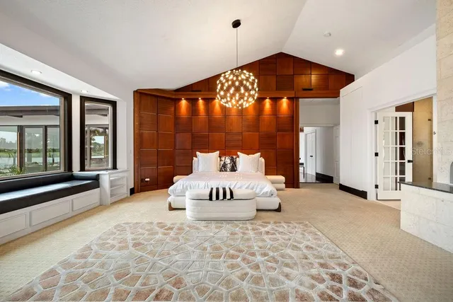 a view of swimming pool with seating area and hardwood floor