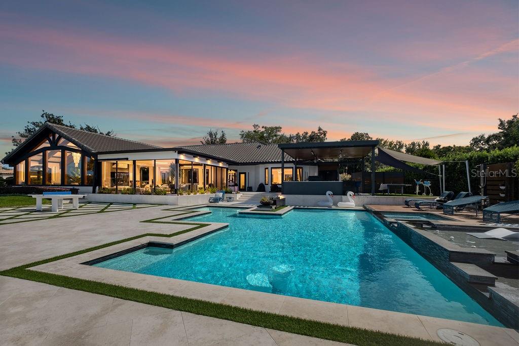 2844 Marquesas Court Windermere, FL 34786 - Photo 4 of 75 a front view of a house with yard and green space