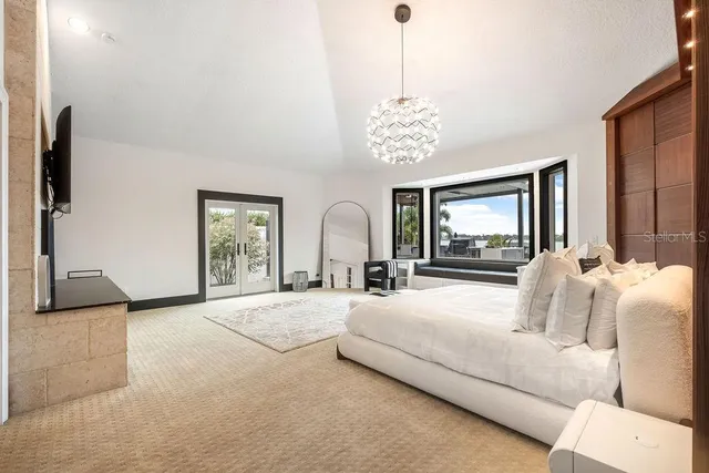 a view of a swimming pool with a lounge chairs