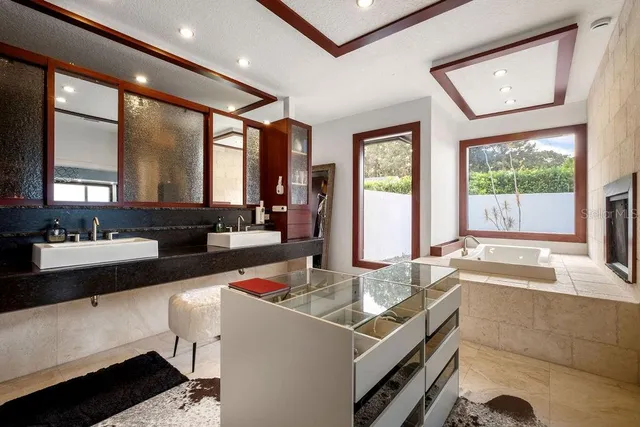 a view of a house with swimming pool and a yard