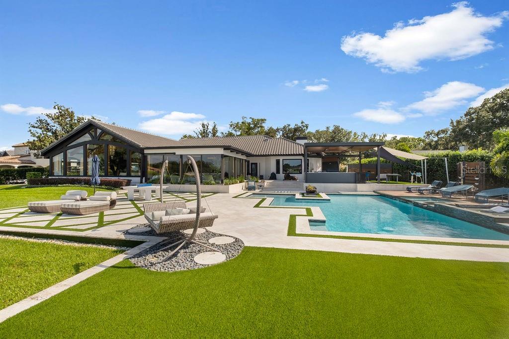 2844 Marquesas Court Windermere, FL 34786 - Photo 5 of 75 a view of a house with swimming pool