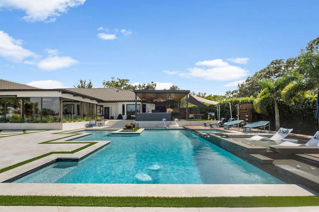 2844 Marquesas Court Windermere, FL 34786 - Photo 58 of 75 a view of a house with swimming pool and sitting area
