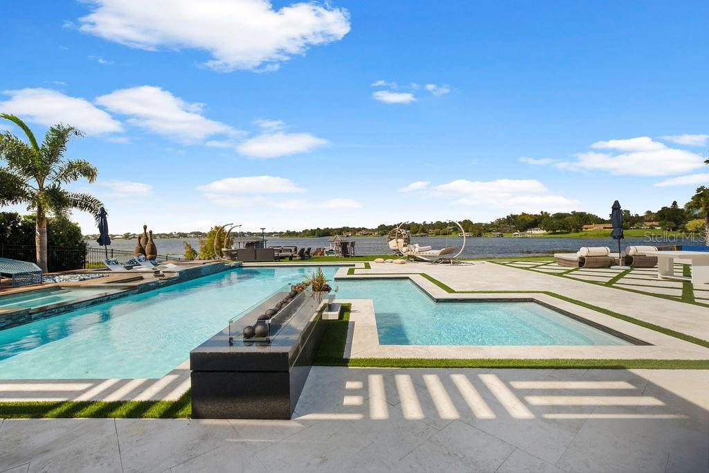 2844 Marquesas Court Windermere, FL 34786 - Photo 62 of 75 a view of swimming pool with outdoor seating and city view