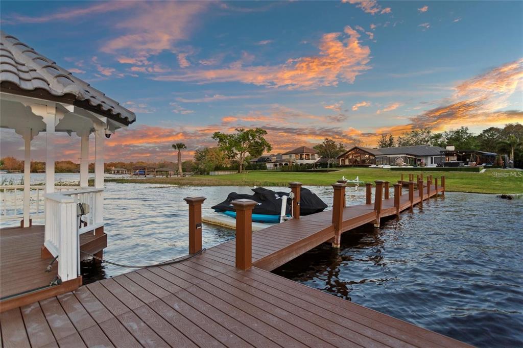 2844 Marquesas Court Windermere, FL 34786 - Photo 69 of 75 a view of a wooden deck with lake view