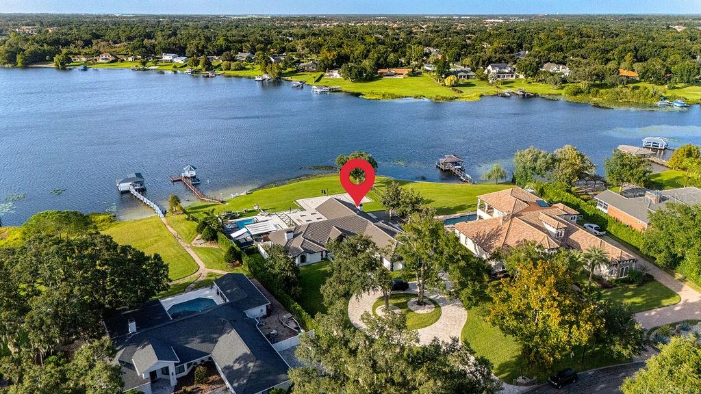 2844 Marquesas Court Windermere, FL 34786 - Photo 71 of 75 an aerial view of a house with a swimming pool yard and outdoor seating