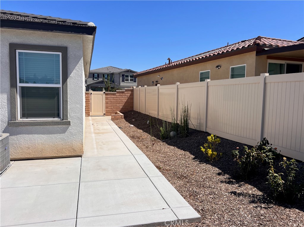 19549 Sunkissed Rdg Drive Riverside, CA 92507 - Photo 17 of 17 a view of a house with a backyard