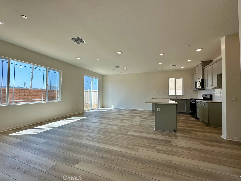 19549 Sunkissed Rdg Drive Riverside, CA 92507 - Photo 4 of 17 a view of kitchen with sink and refrigerator