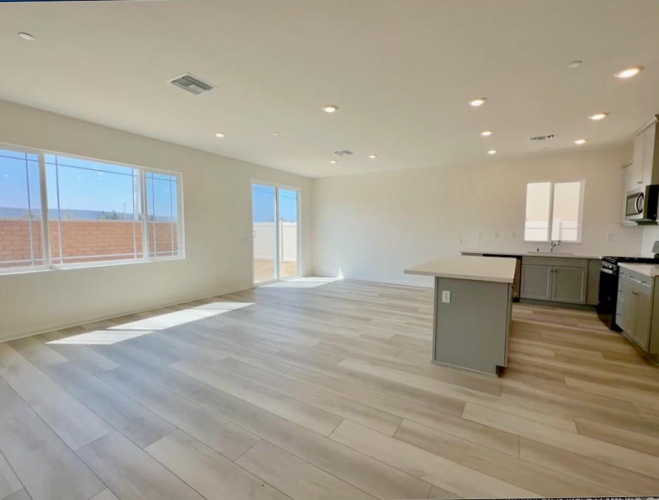 19549 Sunkissed Rdg Drive Riverside, CA 92507 - Photo 7 of 17 a view of an empty room with a window