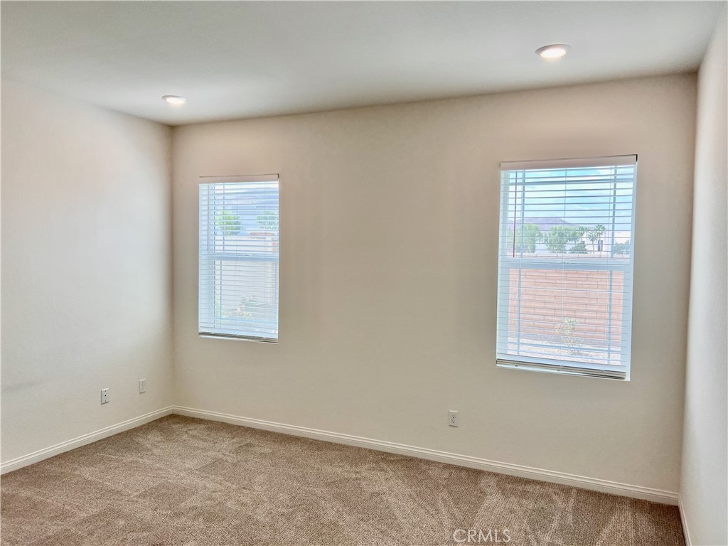 19549 Sunkissed Rdg Drive Riverside, CA 92507 - Photo 10 of 17 an empty room with windows