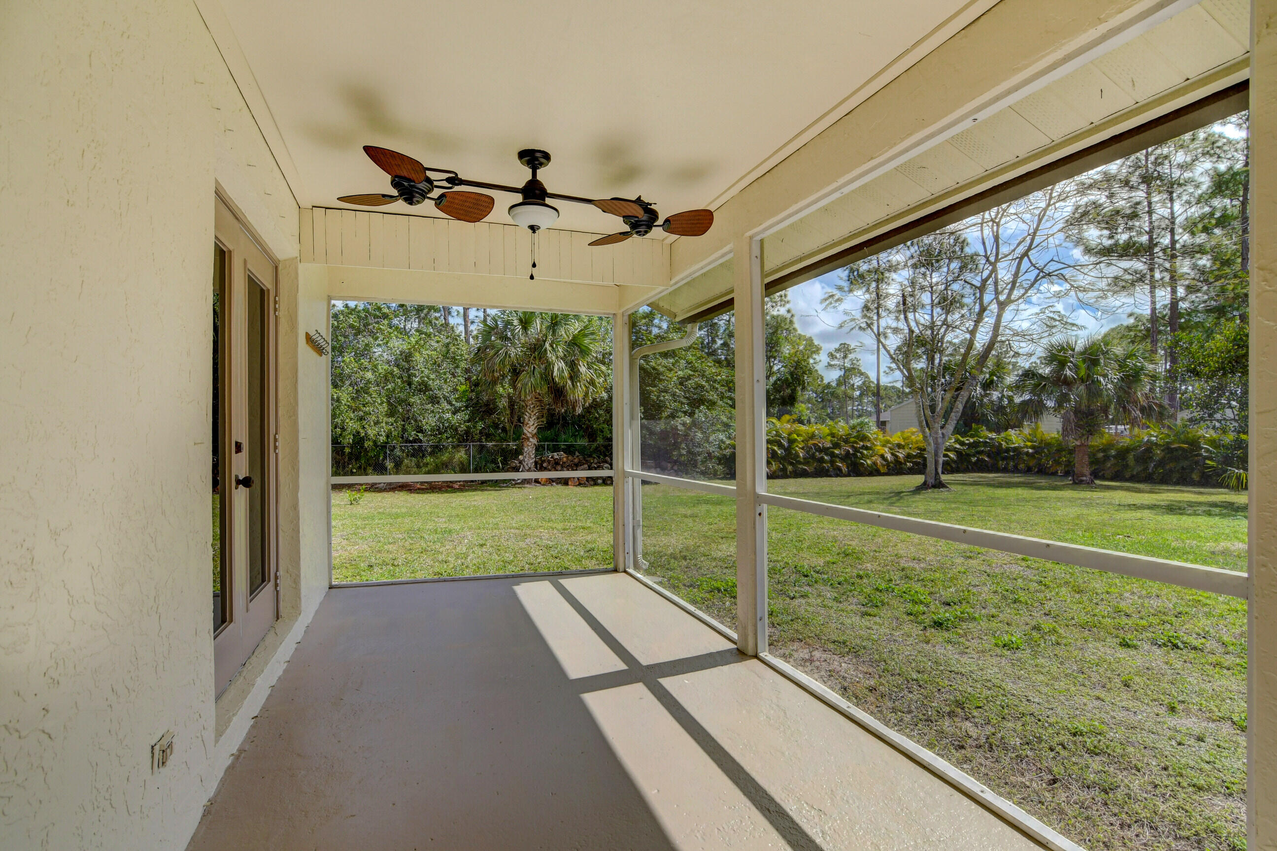 15576 86th Road North Loxahatchee, FL 33470 - Photo 49 of 59 Screened-in Patio