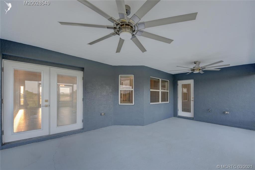 2756 South Brocksmith Road Fort Pierce, FL 34945 - Photo 26 of 35 Covered and Screened-In Back Patio