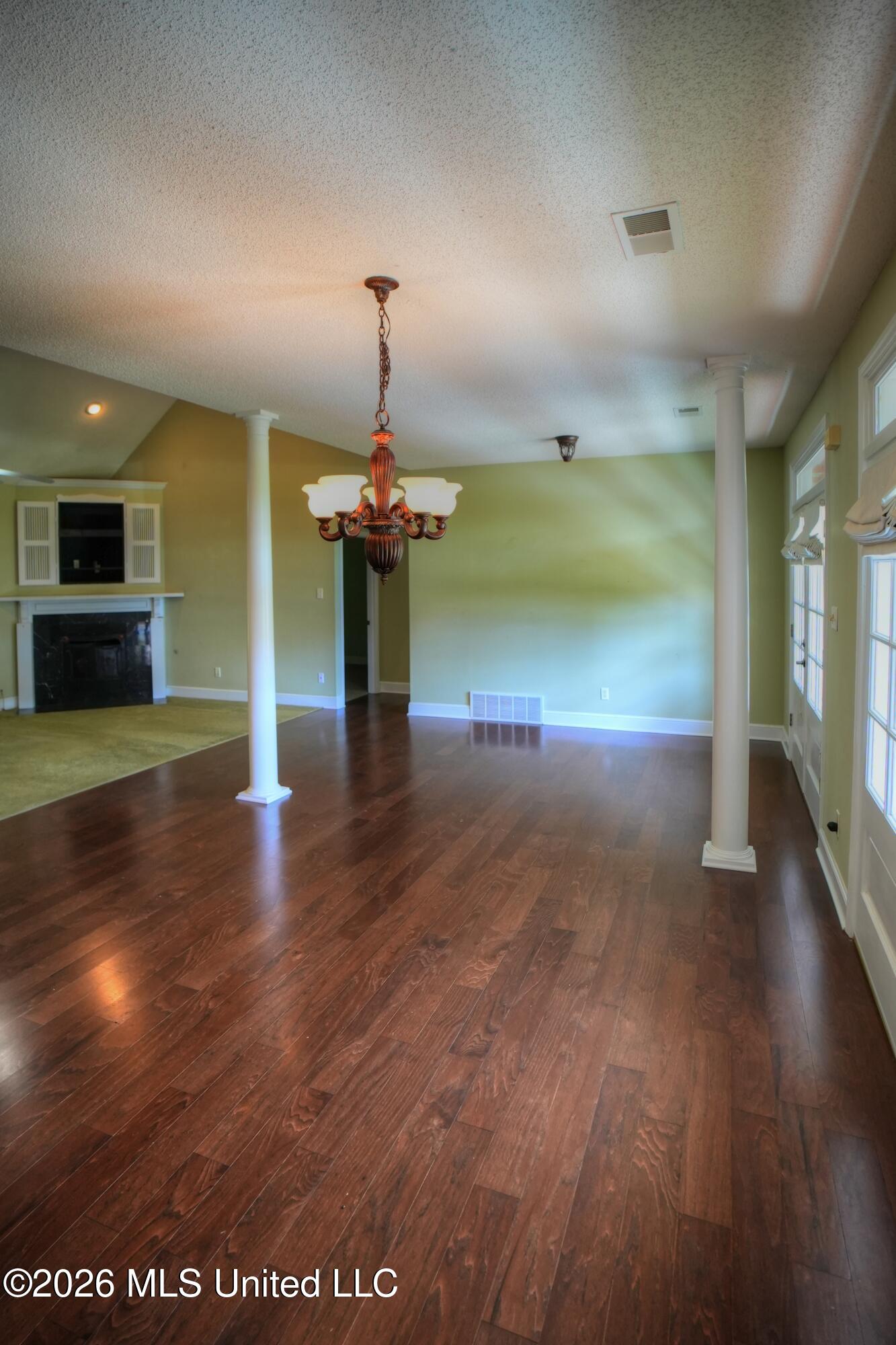 1663 Cedar Trail Cove Hernando, MS 38632 - Photo 5 of 33 1663 Cedar Trail Formal Dining Rm & Den