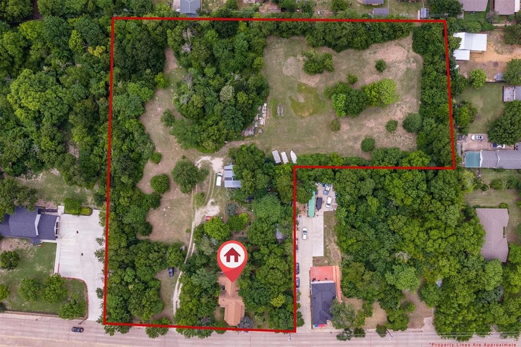 1007 West Belt Line Road Cedar Hill, TX 75104 - Photo 5 of 30 Expansive land parcel featuring dense tree coverage and cleared areas