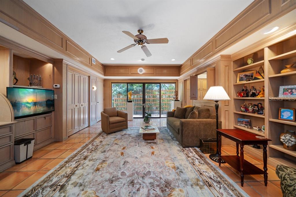 16000 Gulf Boulevard Redington Beach, FL 33708 - Photo 16 of 47 a living room with furniture and a flat screen tv