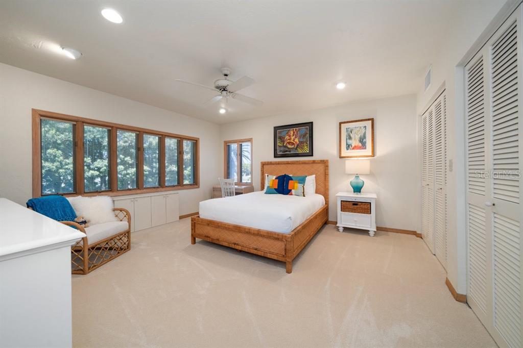 16000 Gulf Boulevard Redington Beach, FL 33708 - Photo 23 of 47 a bedroom with a large bed and a window