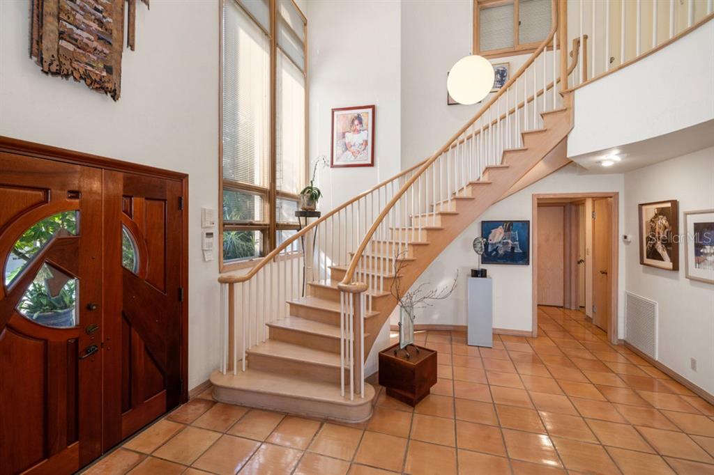 16000 Gulf Boulevard Redington Beach, FL 33708 - Photo 25 of 47 a view of entryway and hall with wooden floor