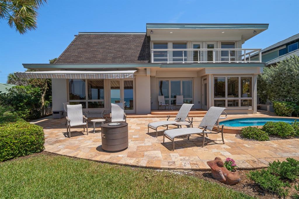 16000 Gulf Boulevard Redington Beach, FL 33708 - Photo 39 of 47 a view of a house with backyard sitting area and garden