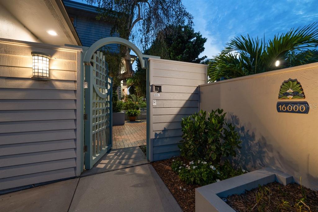 16000 Gulf Boulevard Redington Beach, FL 33708 - Photo 4 of 47 a view of a entrance gate of the house