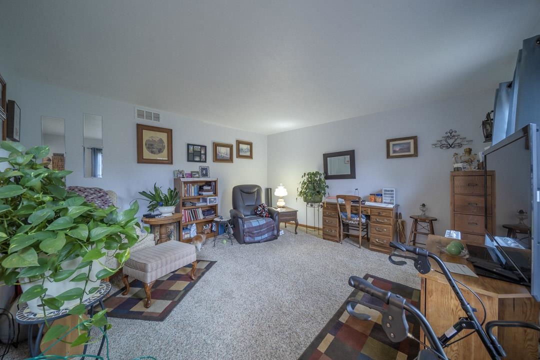1982 Southgate Drive Lake Summerset, IL 61019 - Photo 11 of 33 a living room with furniture and a flat screen tv