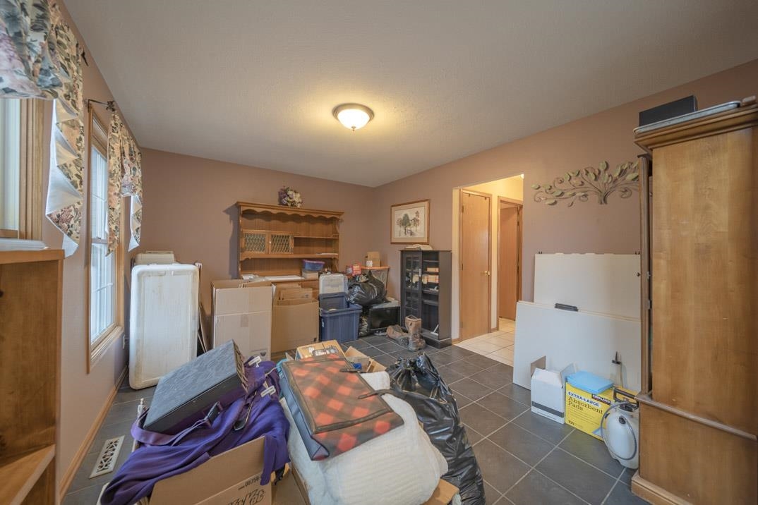 1982 Southgate Drive Lake Summerset, IL 61019 - Photo 12 of 33 a living room with furniture and a flat screen tv