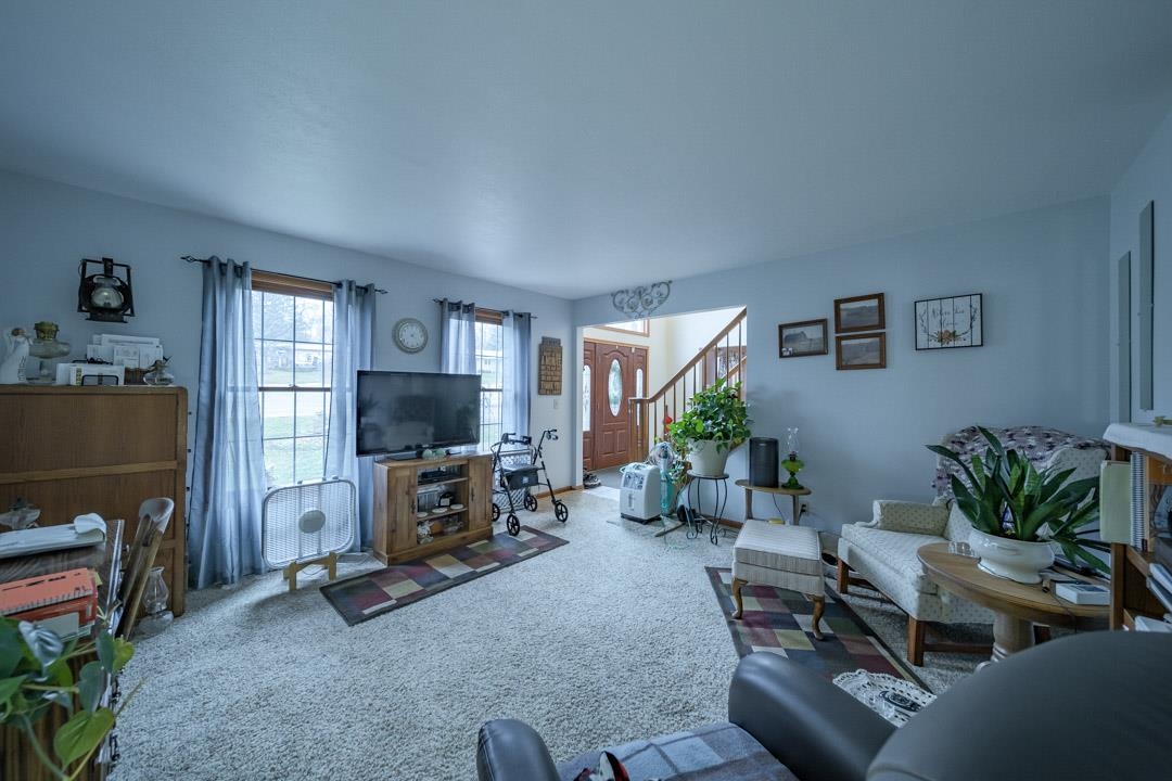 1982 Southgate Drive Lake Summerset, IL 61019 - Photo 14 of 33 a living room with furniture and a fireplace