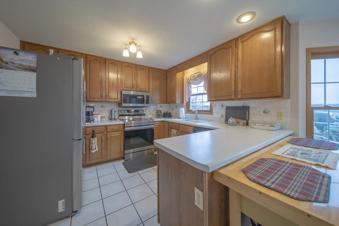 1982 Southgate Drive Lake Summerset, IL 61019 - Photo 10 of 33 a kitchen with a sink stove and cabinets
