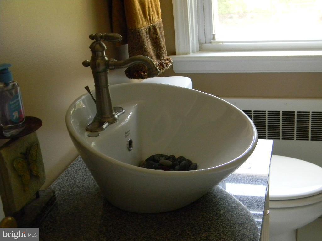 3923 Rexmere Road Baltimore, MD 21218 - Photo 12 of 21 a view of a sink in a bathroom