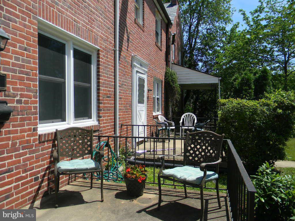 3923 Rexmere Road Baltimore, MD 21218 - Photo 17 of 21 a view of a two chairs in the patio